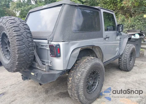 2013 Jeep Wrangler Sport z USA, uszkodzony, nr VIN 1C4AJWAG2DL648315